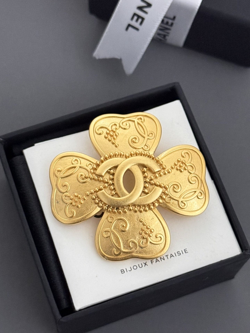 Ch**el brooches